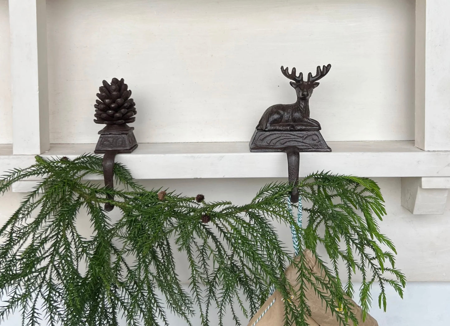 Cast iron pinecone stocking hanger